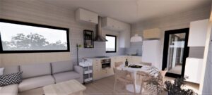 Tuchom - Nowoczesny domek modułowy z funkcjonalną kuchnią, jasnymi oknami i przytulnym wnętrzem. Idealny przykład domku mobilnego, który łączy komfort z mobilnością. Doskonałe rozwiązanie dla osób szukających domów modułowych na każdą okazję.